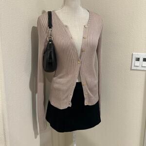 Blumarine tan knit cardigan.